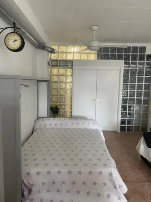 Cama o camas de una habitación en ESTUDIO EN SANJOSE A 50 M DE LA PLAYA