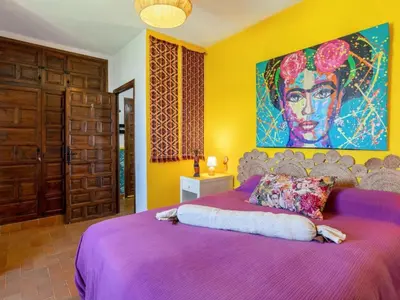 Cama o camas de una habitación en VIVA la FRIDA KAHLO