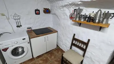 Una cocina o zona de cocina en Cueva la Tita del Pan