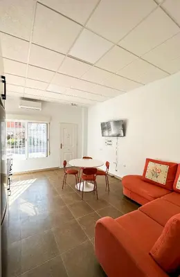 Una televisión o centro de entretenimiento en Casa Primavera