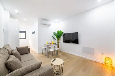 Una televisión o centro de entretenimiento en Trendy Homes Lepanto II, a 5 minutos de Puerta Purchena