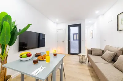 Una televisión o centro de entretenimiento en Trendy Homes Lepanto II, a 5 minutos de Puerta Purchena