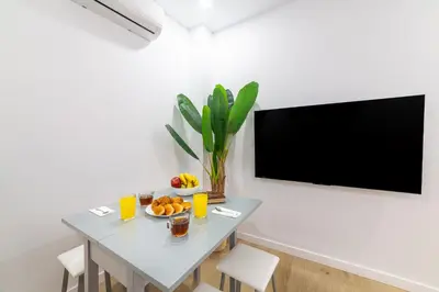 Una televisión o centro de entretenimiento en Trendy Homes Lepanto II, a 5 minutos de Puerta Purchena