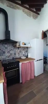 Una cocina o zona de cocina en Bonita Casa Señorial en pleno casco antiguo de Nijar