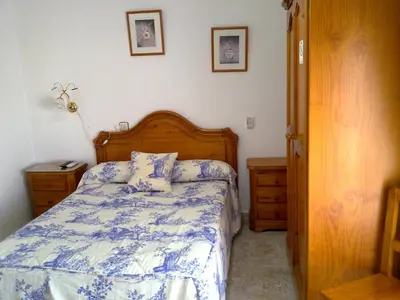 Cama o camas de una habitación en Hostal Asensio Nijar