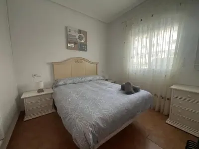 Cama o camas de una habitación en Golf & Beach Apartment