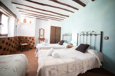 Cama o camas de una habitación en Casas rurales los castaños