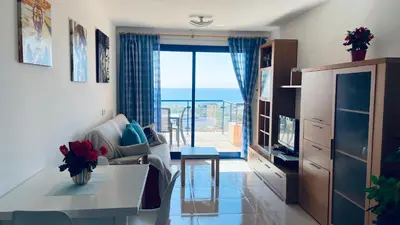 Zona de estar de SUNRISE ATALAYA Amanecer suite