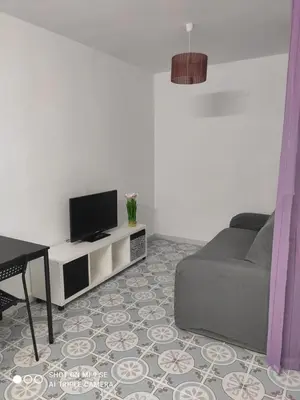Una televisión o centro de entretenimiento en Bonito apartamento en castillo san Felipe Nijar