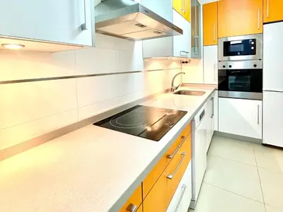 Una cocina o zona de cocina en Apartment in Roquetas near the Beach