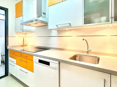 Una cocina o zona de cocina en Apartment in Roquetas near the Beach