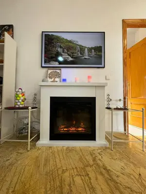Una televisión o centro de entretenimiento en Apartamento en Valle del este Golf, OLV