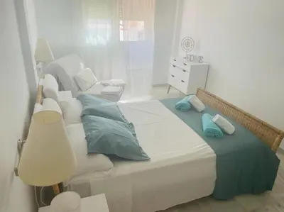 Cama o camas de una habitación en Bahía Vista 6