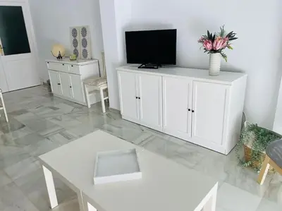 Una televisión o centro de entretenimiento en Bahía Vista 6
