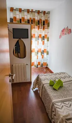 Cama o camas de una habitación en HOSTAL CACHE