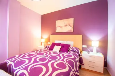 Cama o camas de una habitación en Playa de Levante, Céntrico y Parking - by Aloha Palma