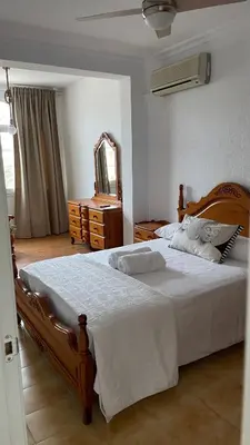 Cama o camas de una habitación en El Paraíso Retamar