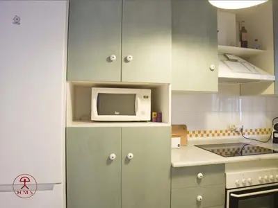Una cocina o zona de cocina en Las Palmeras