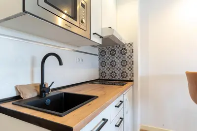 Una cocina o zona de cocina en Almare Suites Burbujas II - Playa y golf a un paso