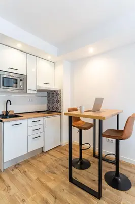 Una cocina o zona de cocina en Almare Suites Burbujas II - Playa y golf a un paso
