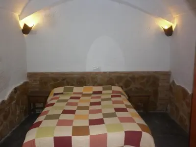 Cama o camas de una habitación en Casa Cueva Rural LA TEJA 8