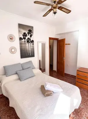 Cama o camas de una habitación en Apartamento Junto al Mar