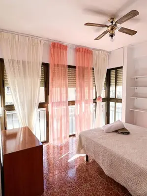 Cama o camas de una habitación en Apartamento Junto al Mar