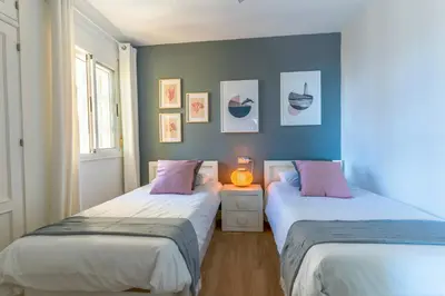 Cama o camas de una habitación en Apartamento Pura Vida! Vistas al mar, playa a 5 min. Terraza, WiFi y A/A.