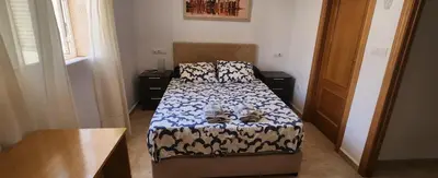 Cama o camas de una habitación en Dúplex en los Collados