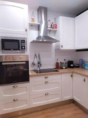 Una cocina o zona de cocina en Casa con jardín
