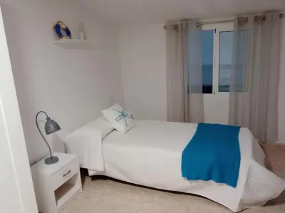 Cama o camas de una habitación en Paraíso Azul