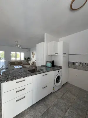 Una cocina o zona de cocina en Apartamento Las Olas