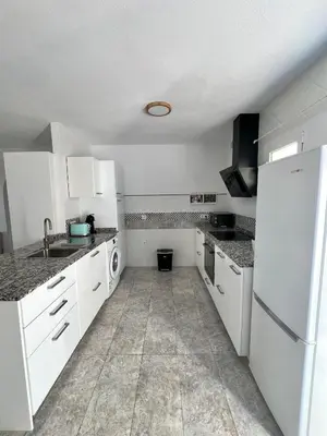 Una cocina o zona de cocina en Apartamento Las Olas