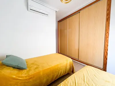 Cama o camas de una habitación en Casa Lodelia-Maison climatisée avec vue mer et montagne