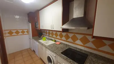 Una cocina o zona de cocina en ALANDALUSTHALASSA.COM Apartamento Planta Baja