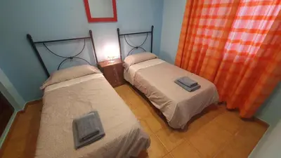 Cama o camas de una habitación en ALANDALUSTHALASSA.COM Apartamento Planta Baja