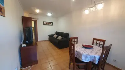 Zona de estar de ALANDALUSTHALASSA.COM Apartamento Planta Baja