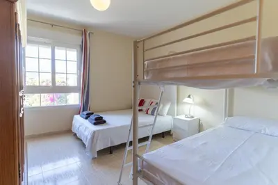 Cama o camas de una habitación en TrendyHomes Aguadulce Playa