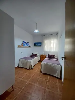 Cama o camas de una habitación en Amaneceres del Cabo