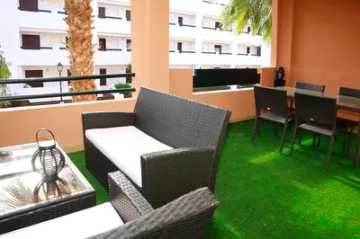Zona de estar de Palami Vera con terraza, WIFI 300mb, piscina y garaje privado