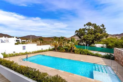 Piscina en o cerca de Genoveses Suites, 3 Hab, garaje, piscina, solárium y WiFi