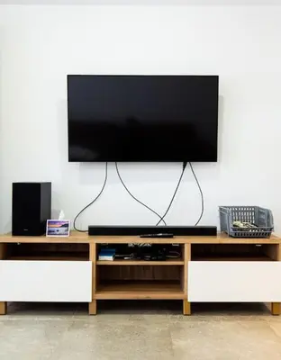 Una televisión o centro de entretenimiento en Villa Serena
