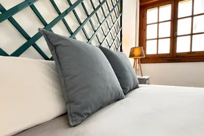 Cama o camas de una habitación en Apartamentos Vela Blanca