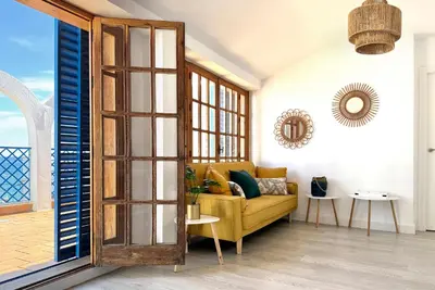 Zona de estar de Apartamentos Vela Blanca