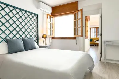 Cama o camas de una habitación en Apartamentos Vela Blanca