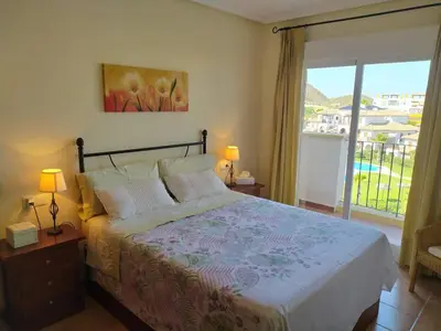 Cama o camas de una habitación en RELAX en Vera Playa con SPA