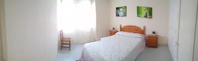 Cama o camas de una habitación en APARTAMENTO PUERTO GOLF