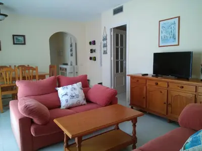Una televisión o centro de entretenimiento en APARTAMENTO PUERTO GOLF