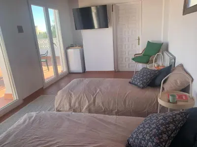 Cama o camas de una habitación en Villa Casa Queen