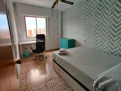 Cama o camas de una habitación en Piso cerca Playa con 2 duchas y 5 Aires Acondicionados